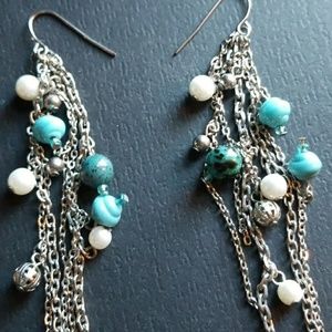 Silver dangle earrings. Turquoise detail